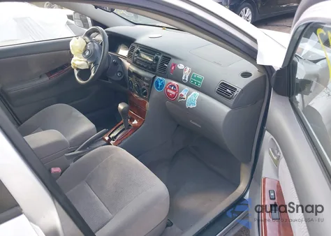 2005 Toyota Corolla Le z USA, uszkodzony, nr VIN JTDBR32E552053684